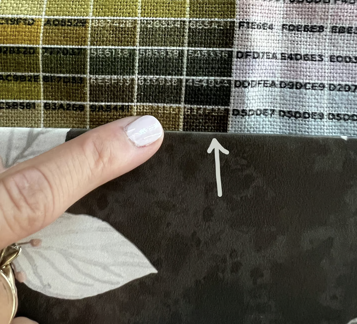 a floral fabric with a brown background matched up to the corresponding color on a color map
