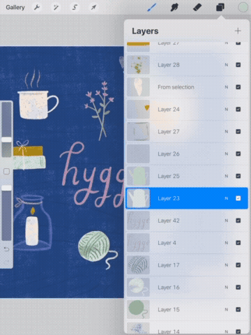 a gif showing someone swiping to group layers in procreate