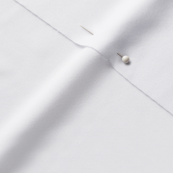 Close up of unprinted white sport pique fabric
