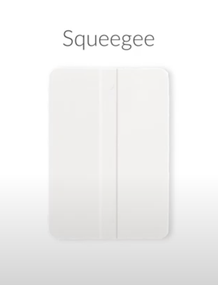 White plastic squeegee